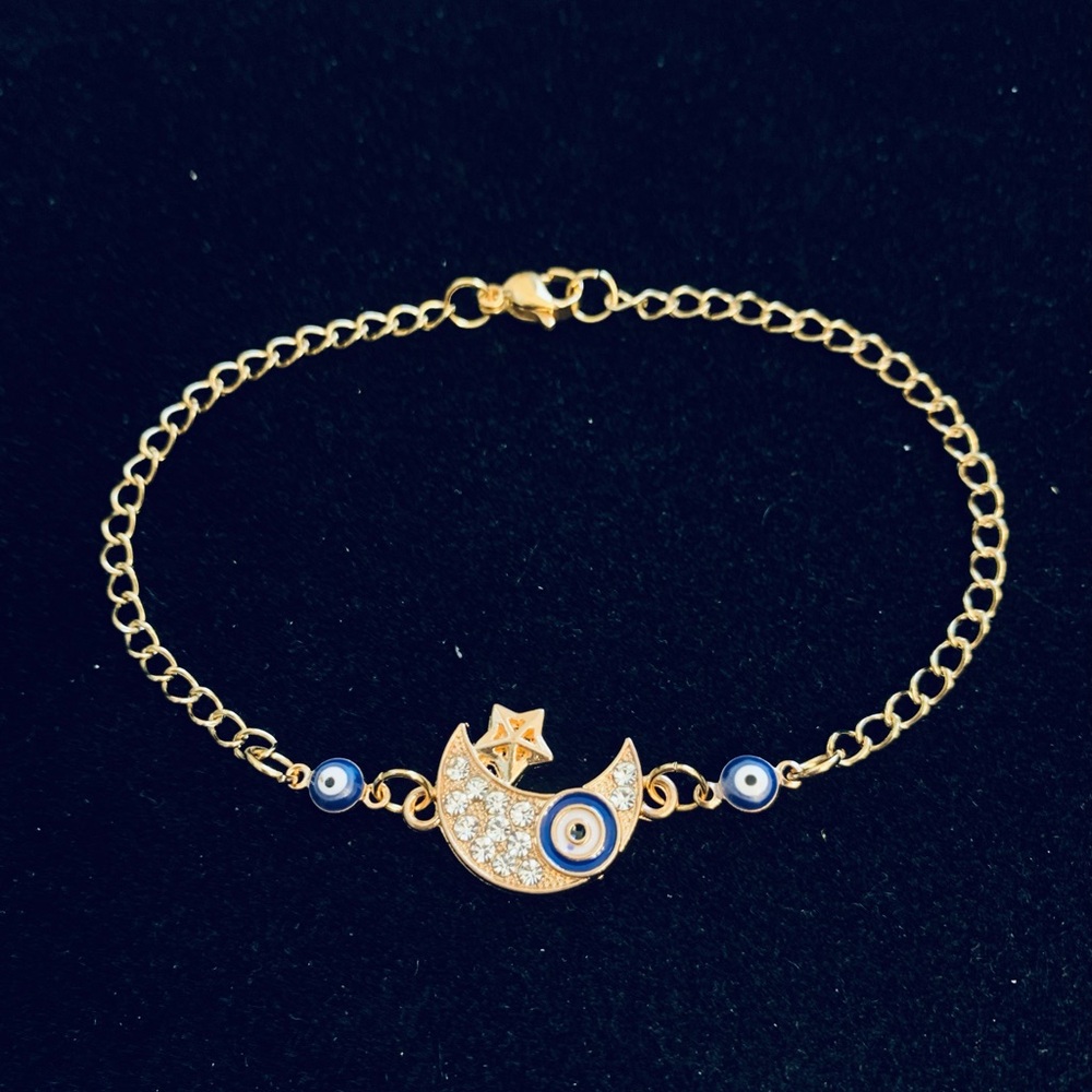 Rhinestone Crescent Moon with Evil Eye bracelet gold